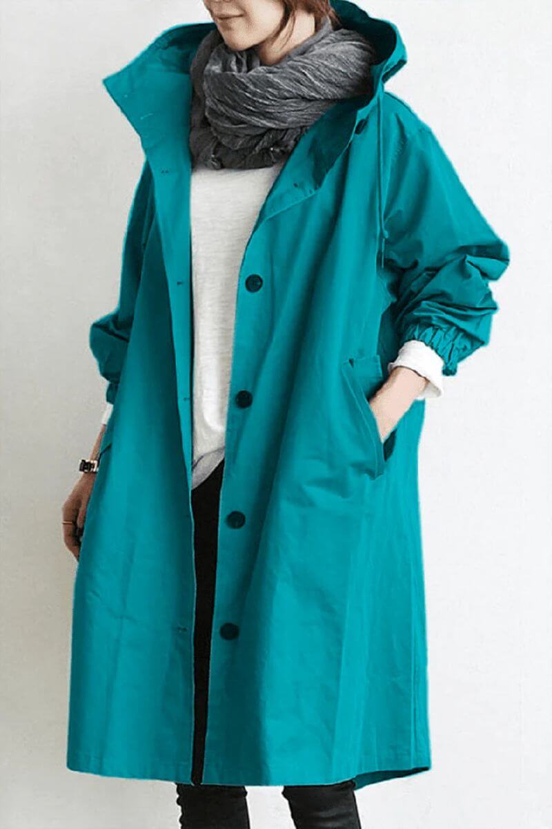 Emma’s lange regenjas voor dames in turquoise, waterdicht met capuchon